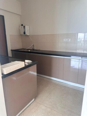 Kitchen in 3 BHK Apartment at Gera World of Joy, Kharadi – for Rent