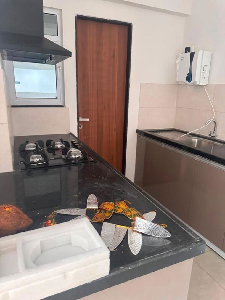 Kitchen, gera-world-of-joy 3 Bedroom 1073 Sq.Ft. Apartment In Kharadi Pune 10538608