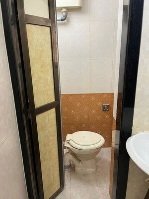Bathroom in 2 BHK Apartment at Mantri Serene, Goregaon East – for Rent