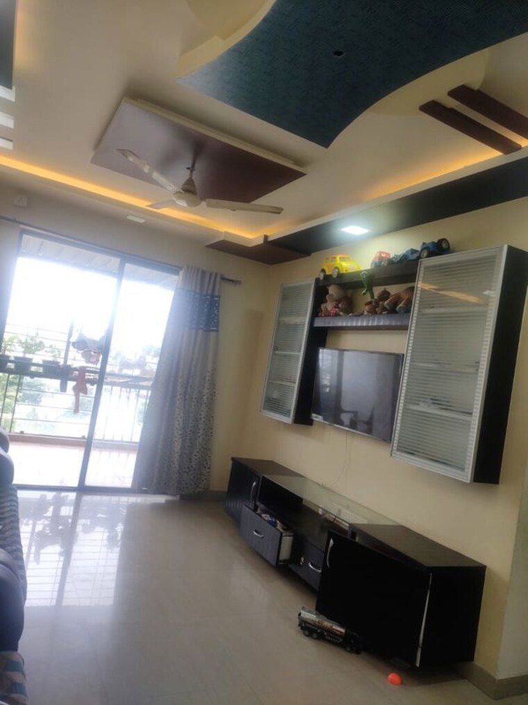 Living Room, gurukrupa-astter 2 Bedroom 1100 Sq.Ft. Apartment In Wadgaon Sheri Pune 10538753