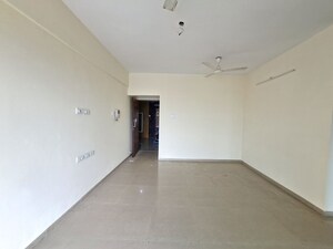 Living Room in 2 BHK Apartment at Rustomjee Urbania Acura, Thane West – for Sale