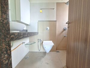Bathroom in 2 BHK Apartment at Rustomjee Urbania Acura, Thane West – for Sale