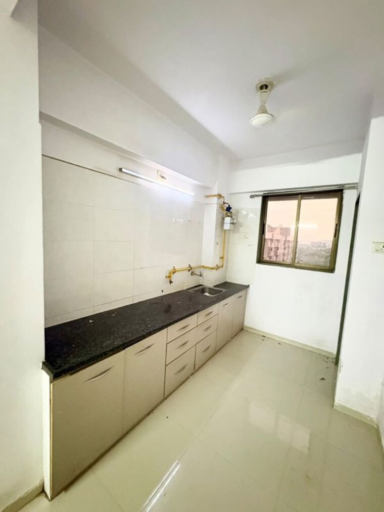 Kitchen, bakeri-shaunak-apartments 2 Bedroom 990 Sq.Ft. Apartment In Vejalpur Ahmedabad 10538842