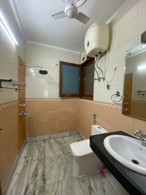 Bathroom in 2 BHK Builder Floor at Ansal Plaza Sector-23, Sector 23 – for Rent