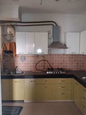 Kitchen in 3 BHK Apartment at Mahagun Mywoods, Sector 16c Greater Noida – for Rent