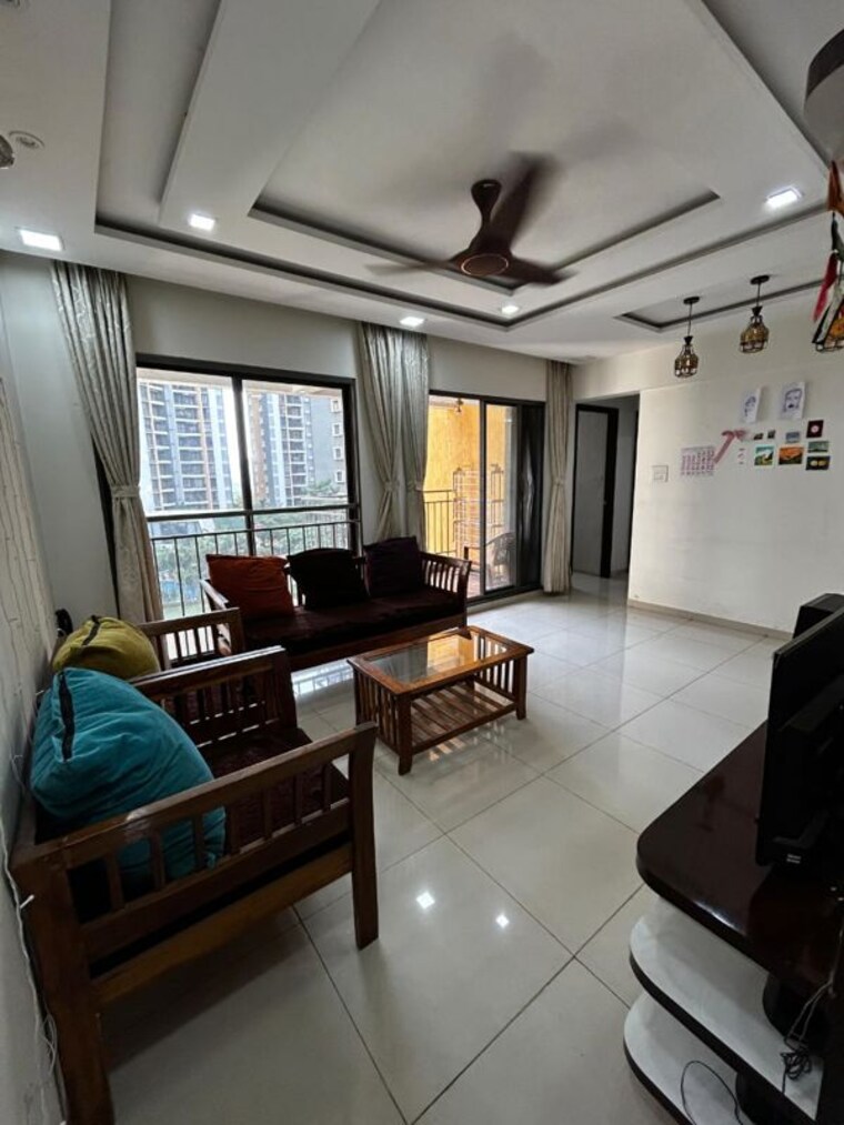 Living Room, shapoorji-pallonji-joyville-hinjewadi 2 Bedroom 855 Sq.Ft. Apartment In Hinjewadi Pune 10539031