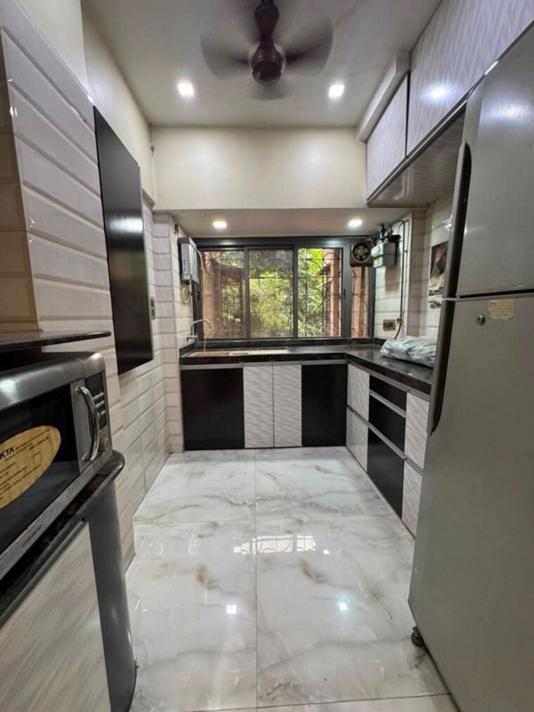 Kitchen, seven-bungalow 1 Bedroom 500 Sq.Ft. Apartment In Andheri West Mumbai 10539035