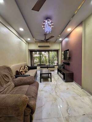Living Room in 1 BHK Apartment at Seven Bungalow, Andheri West – for Rent