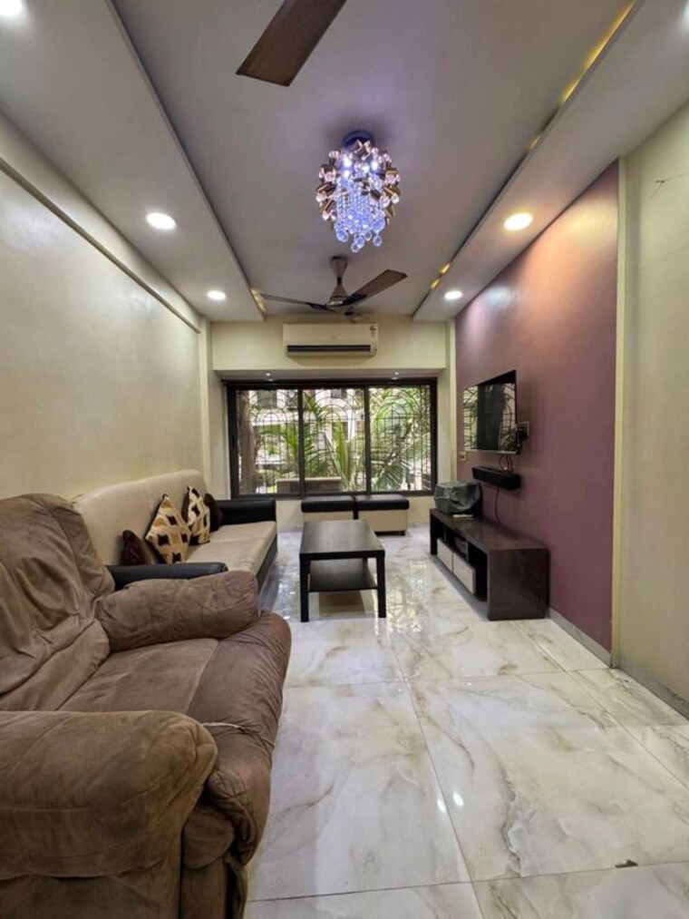 Living Room, seven-bungalow 1 Bedroom 500 Sq.Ft. Apartment In Andheri West Mumbai 10539035