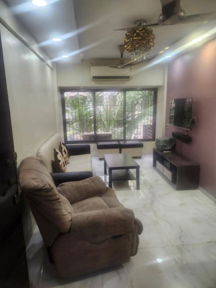 Living Room, seven-bungalow 1 Bedroom 500 Sq.Ft. Apartment In Andheri West Mumbai 10539035