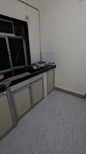 Kitchen in 1.5 BHK Apartment at Suchita CHS, Santacruz East – for Rent