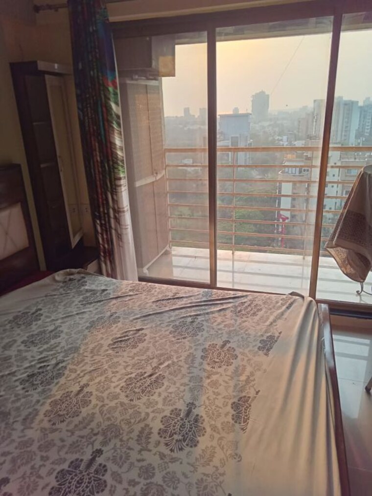 Bedroom, sunil-nivas-society 2 Bedroom 860 Sq.Ft. Apartment In Andheri West Mumbai 10539239
