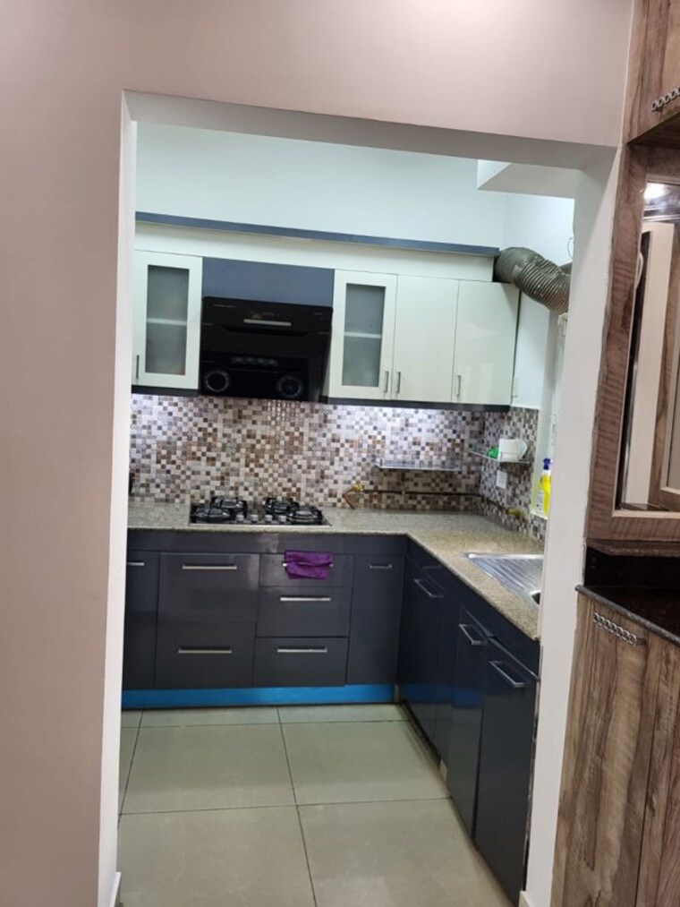 Kitchen, grihapravesh 2 Bedroom 1150 Sq.Ft. Apartment In Sector 77 Noida 10539294