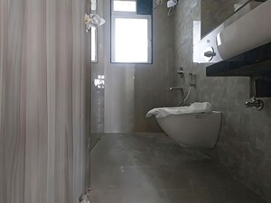 Bathroom in 2 BHK Apartment at Ashar Axis, Majiwada – for Rent