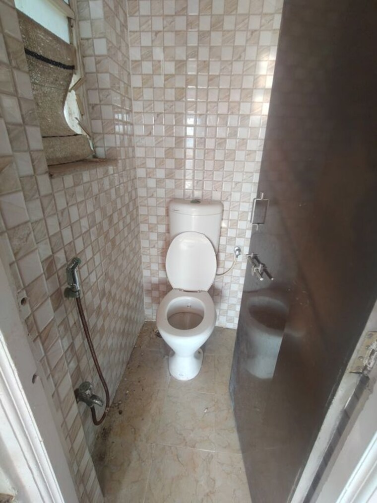 Bathroom, goel-sai-ganga 1 Bedroom 640 Sq.Ft. Apartment In Undri Pune 10539436