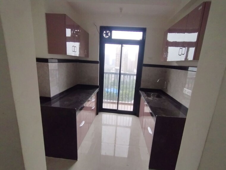 Kitchen, damji-shamji-mahavir-spring-tulip-phase-1 1 Bedroom 470 Sq.Ft. Apartment In Pokhran Road No Two Thane 10539452