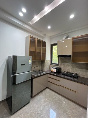 Kitchen in 1 RK Builder Floor at Ansal Sushant Lok I, Sector 43 – for Rent