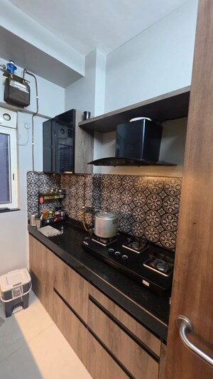 Kitchen in 1 BHK Apartment at Lodha Amara, Kolshet Road – for Sale