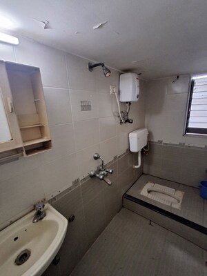 Bathroom in 4 BHK Apartment at Swastik Park CHS Goregaon, Goregaon West – for Rent