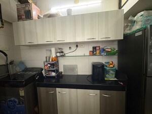 Kitchen in 2 BHK Apartment at Shiv Mahima, Malad West – for Rent