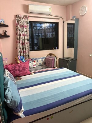 Bedroom in 2 BHK Apartment at Shiv Mahima, Malad West – for Rent