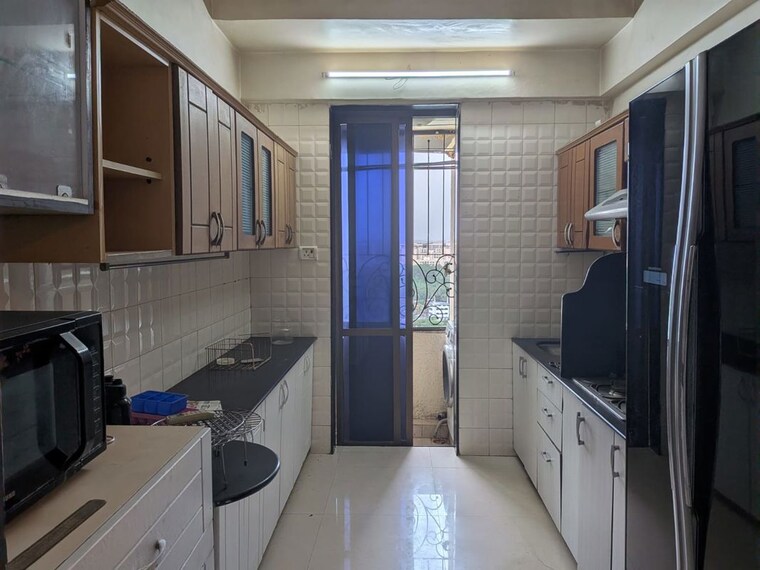 Kitchen, lake-home 3 Bedroom 1365 Sq.Ft. Apartment In Powai Mumbai 10539796