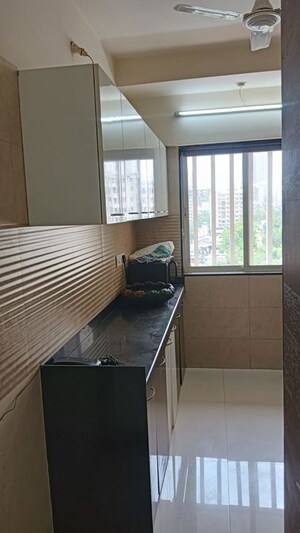 Kitchen in 2 BHK Apartment at Shiv Mahima, Malad West – for Rent