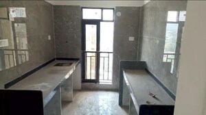 Kitchen in 2 BHK Apartment at DGS Sheetal Regalia, Borivali East – for Rent