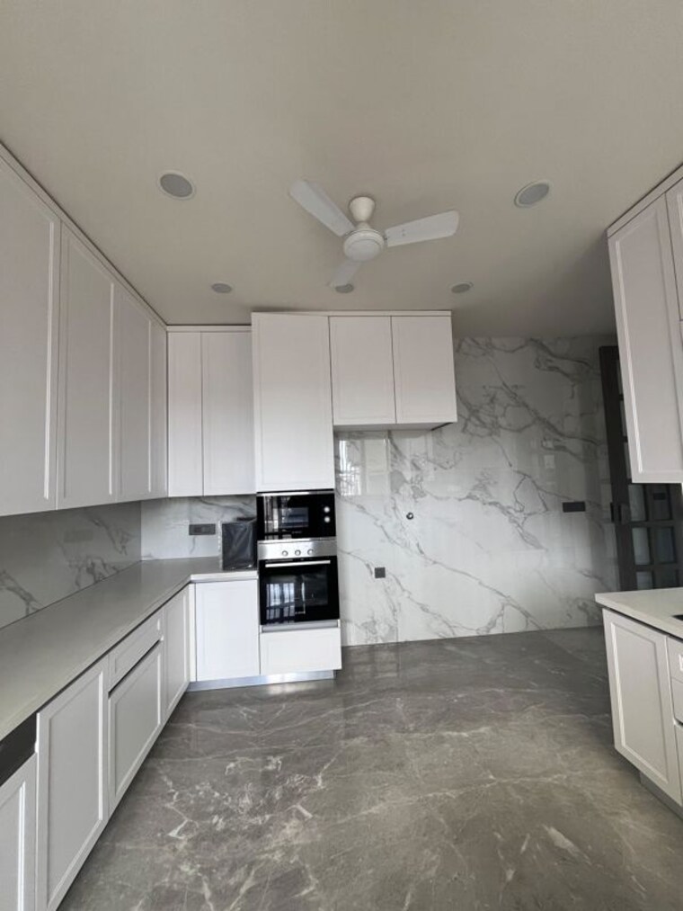 Kitchen, defence colony 4 Bedroom 400 Sq.Yd. Builder Floor In Defence Colony Delhi 10540060