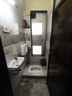 Bathroom in 1 BHK Apartment at Sumit Abode II, Matunga – for Rent