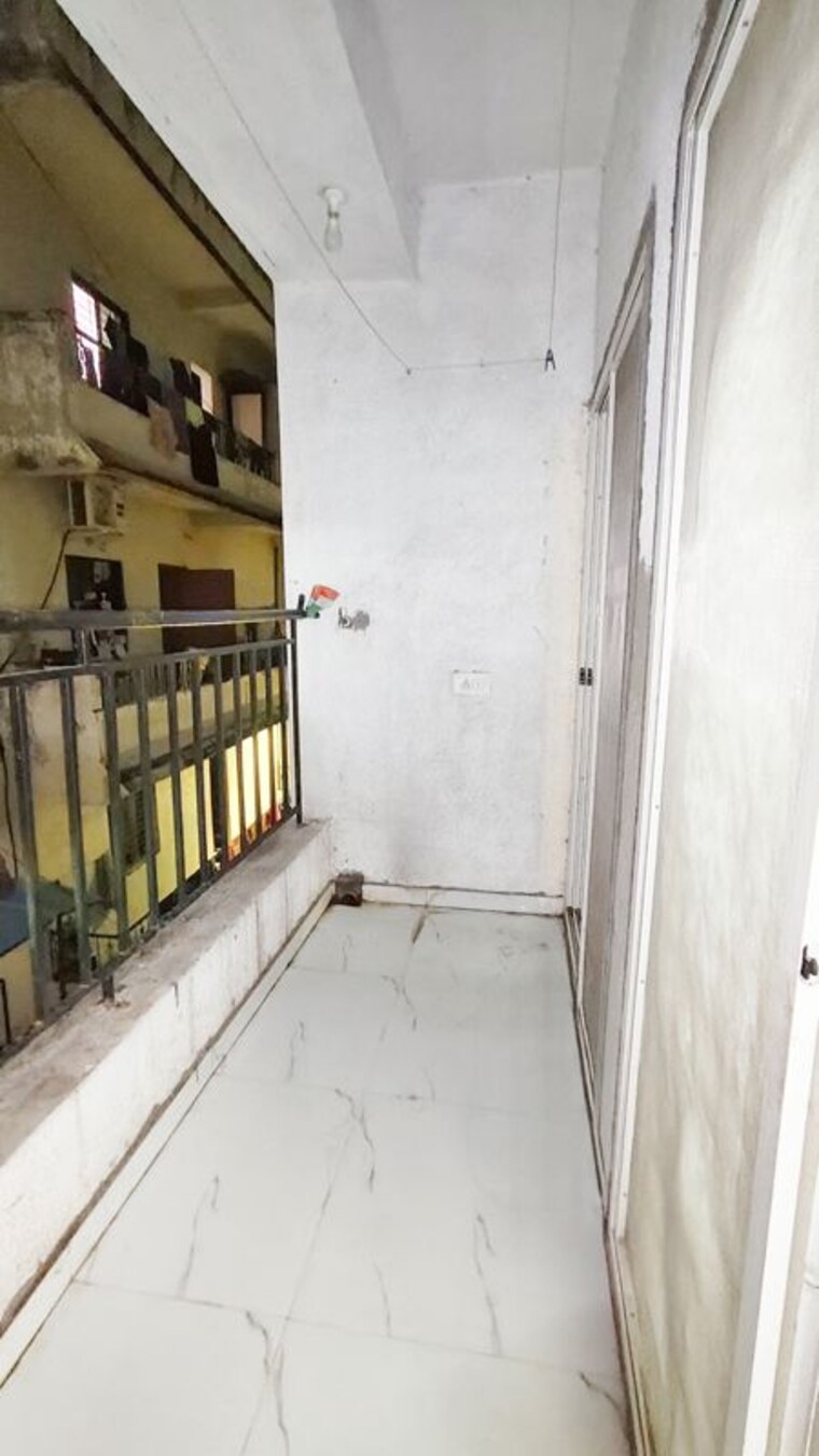 Balcony, anand-park 2.5 Bedroom 950 Sq.Ft. Apartment In Wadgaon Sheri Pune 10540071