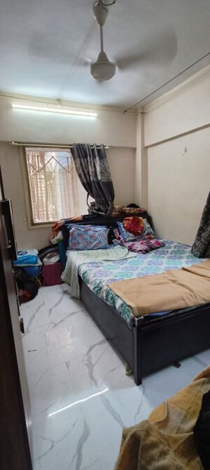 Bedroom in 1 BHK Apartment at New Prem Nagar CHS, Borivali West – for Rent