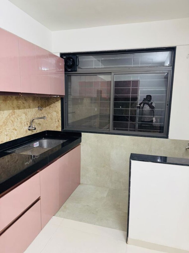 Kitchen, pristine-ilife 2 Bedroom 1102 Sq.Ft. Apartment In Mundhwa Pune 10540168