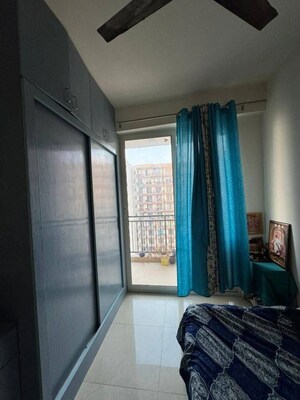 Building Lobby in 2 BHK Apartment at ROF Aalayas, Sector 102 – for Sale