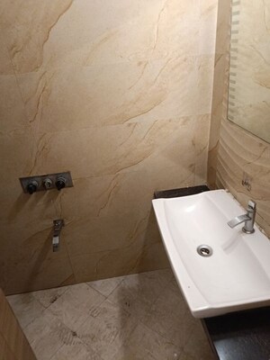 Bathroom in 2.5 BHK Apartment at Rattan Icon, Seawoods Sector 50 – for Rent