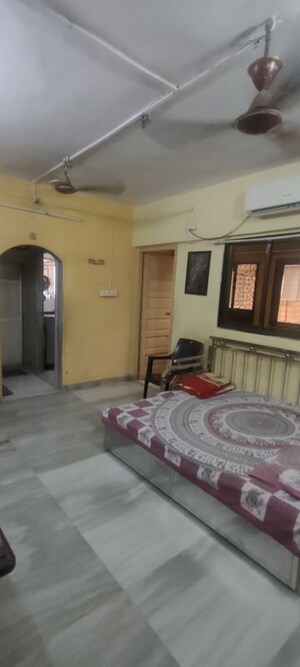 Living Room in 1 RK Apartment at Mohan Nagar CHS, Kandivali West – for Sale