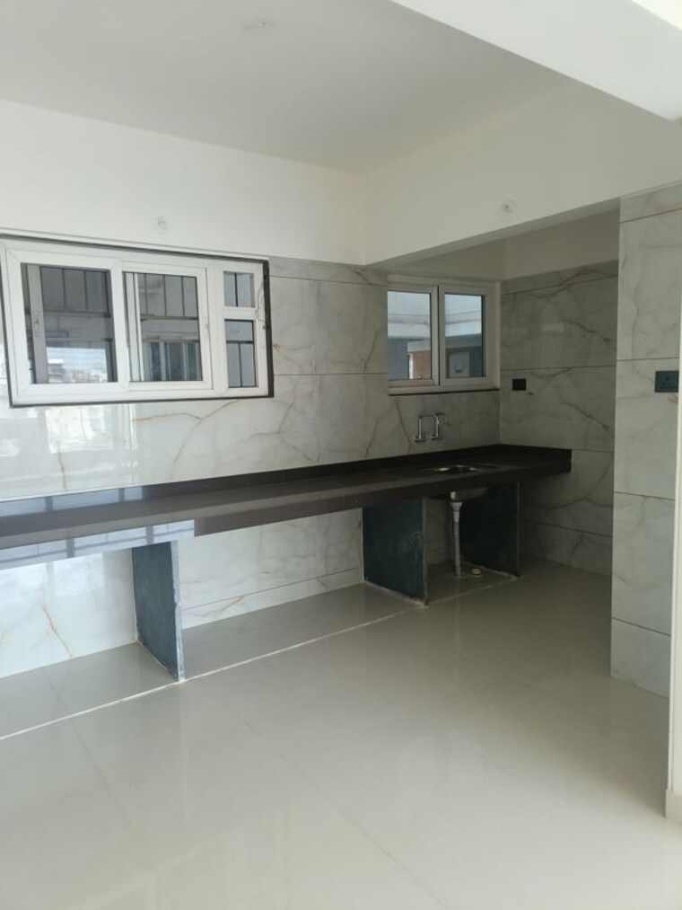 Kitchen, sonigara-57-avenue 3 Bedroom 1152 Sq.Ft. Apartment In Wakad Pune 10540558
