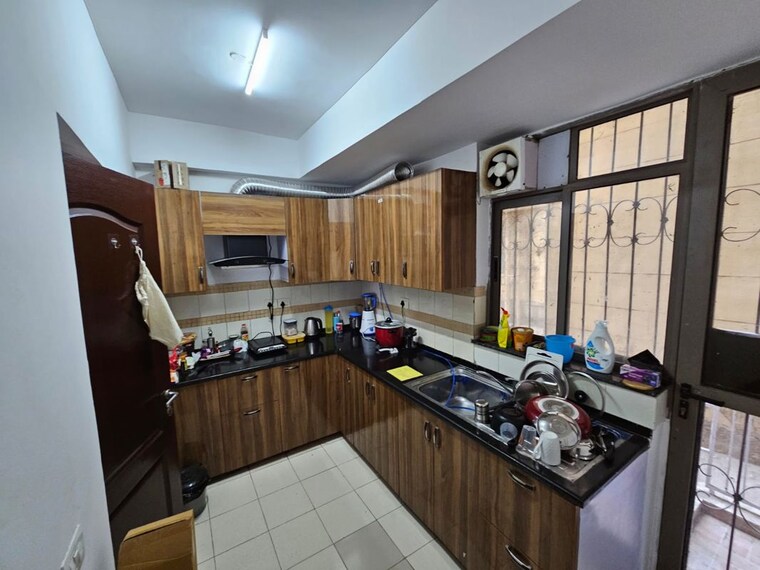 Kitchen, unitech-uniworld-gardens-2 3 Bedroom 1850 Sq.Ft. Apartment In Sector 47 Gurgaon 10540586