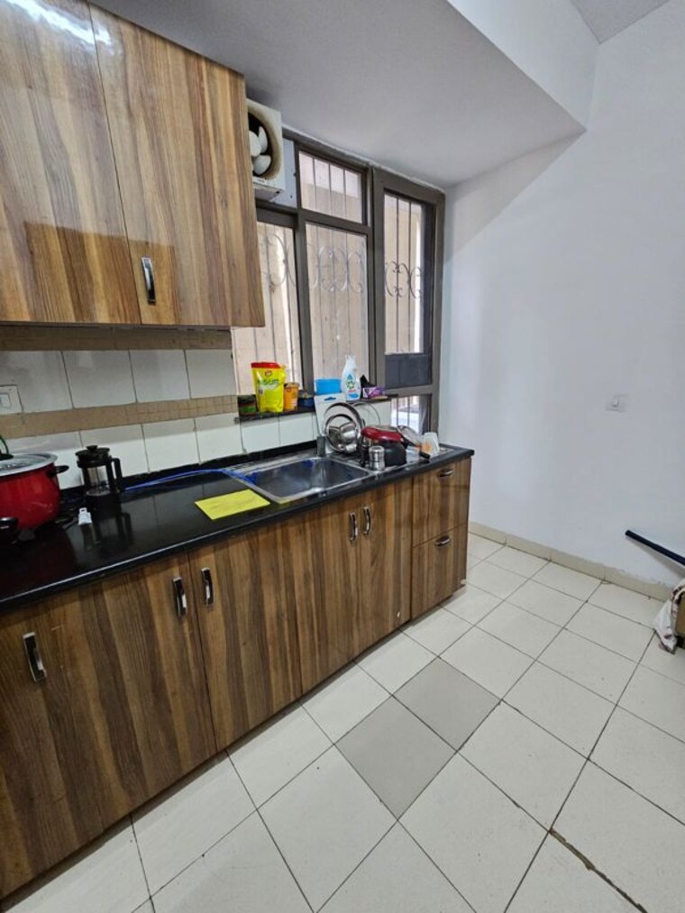 Kitchen, unitech-uniworld-gardens-2 3 Bedroom 1850 Sq.Ft. Apartment In Sector 47 Gurgaon 10540586