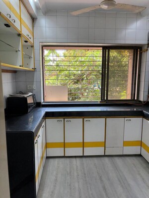 Kitchen in 2 BHK Apartment at Om Shanaaz Apartments, Andheri West – for Rent