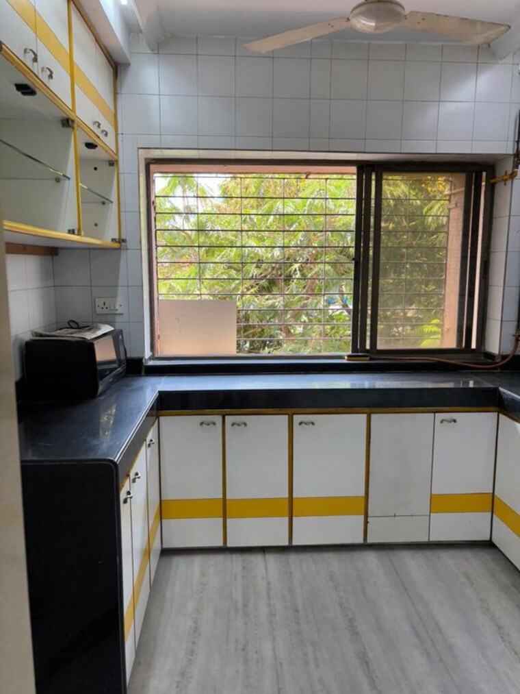 Kitchen, om-shanaaz-apartments 2 Bedroom 735 Sq.Ft. Apartment In Andheri West Mumbai 10540708