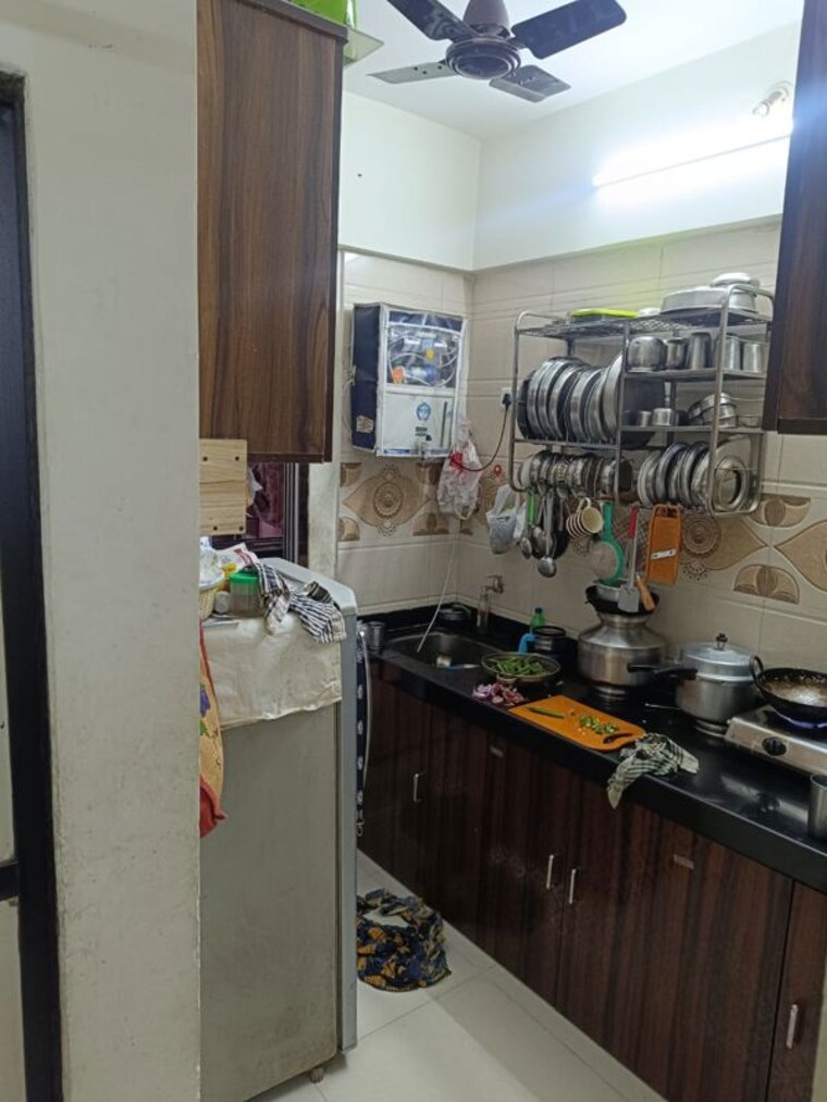 Kitchen, dombala 1 Bedroom 620 Sq.Ft. Apartment In Dombala Navi Mumbai 10540728