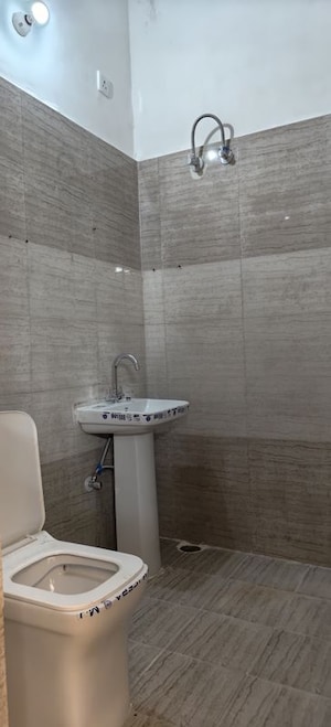 Bathroom in 2 BHK Apartment at Aura Homes, Patiala Road – for Rent