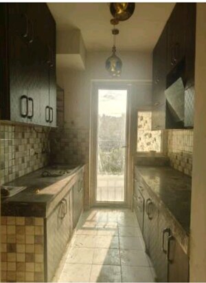 Kitchen in 3 BHK Apartment at Mapsko Paradise, Sector 83 – for Rent