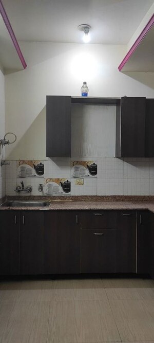 Kitchen in 2 BHK Apartment at Surya Homes Noida, Sector 72 – for Rent