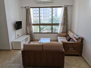 Living Room in 2 BHK Apartment at Lodha Luxuria, Majiwada – for Rent