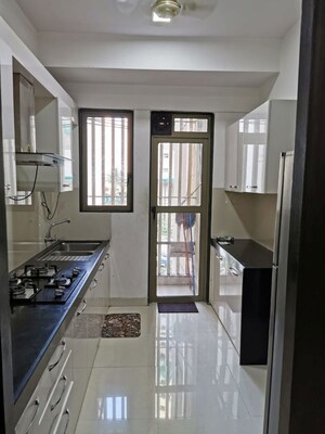 Kitchen in 2 BHK Apartment at Lodha Luxuria, Majiwada – for Rent