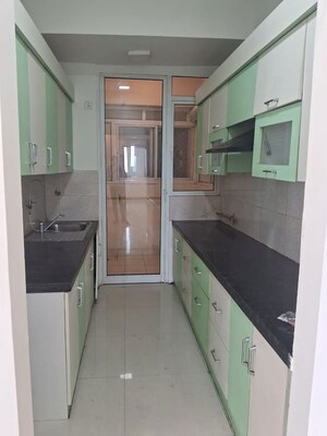 Kitchen in 3 BHK Apartment at Gaur Sportswood, Sector 79 – for Rent