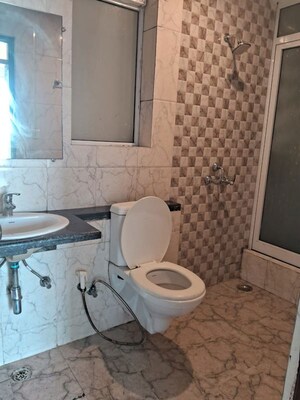 Bathroom in 3 BHK Apartment at Gaur Sportswood, Sector 79 – for Rent