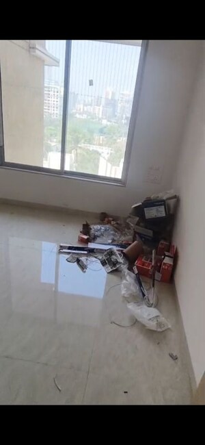 Room in 1 BHK Apartment at Parekh Celeste, Goregaon West – for Sale
